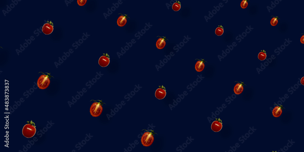 Colorful pattern of fresh red tomatoes on dark blue background. Top view. Flat lay. Pop art design Colorful pattern of fresh red tomatoes on dark blue background. Top view. Flat lay. Pop art design