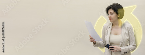 Refresh arrow neon icon around bisiness  woman reading paper presentation with copy space business background, reload concept. photo