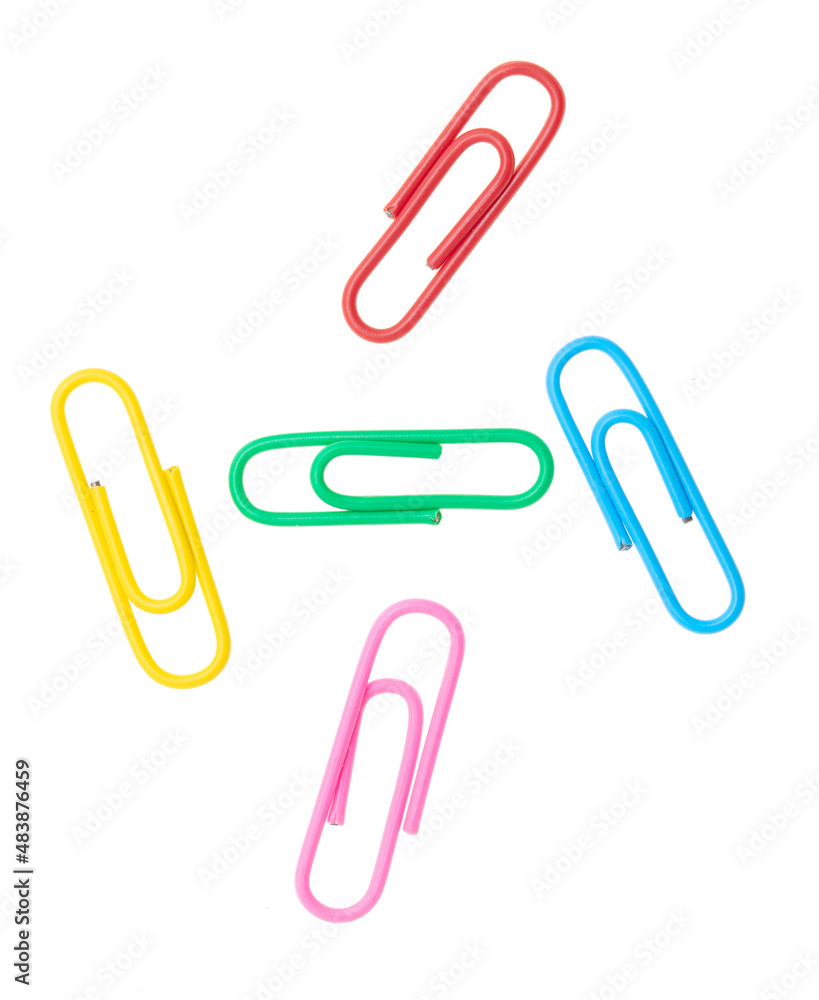 Multi-colored paper clips isolated on a white Multi-colored paper clips isolated on a white