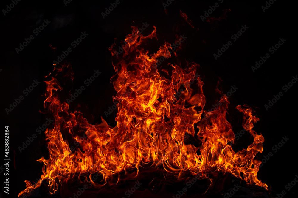 Fire blaze flames on black background. Fire burn flame isolated, abstract texture. Flaming explosion effect with burning fire. Fire blaze flames on black background. Fire burn flame isolated, abstract texture. Flaming explosion effect with burning fire.