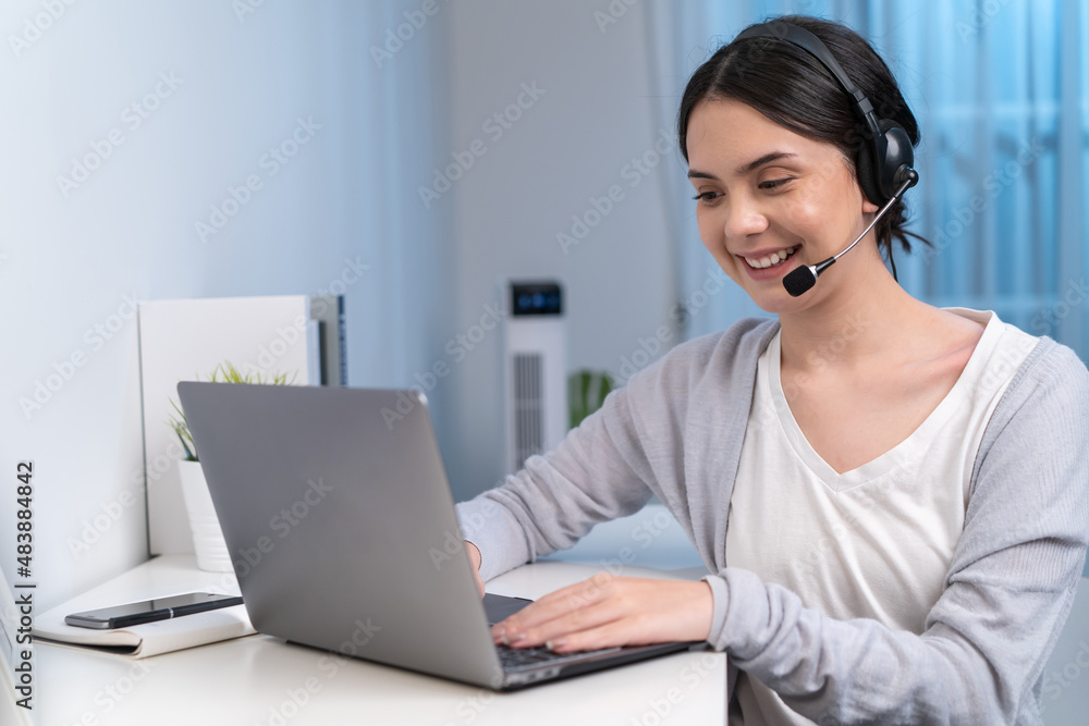 Asian young beautiful businesswoman working at home during night time. Asian young beautiful businesswoman working at home during night time.