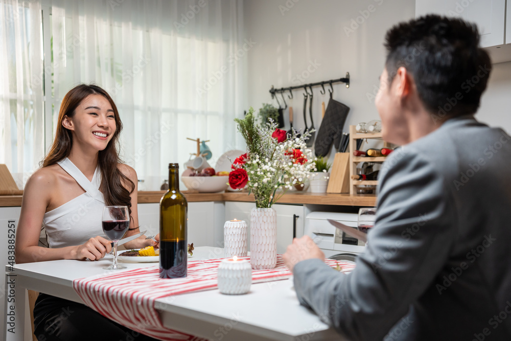 Asian young couple having dinner to celebrate valentine's day together Asian young couple having dinner to celebrate valentine's day together
