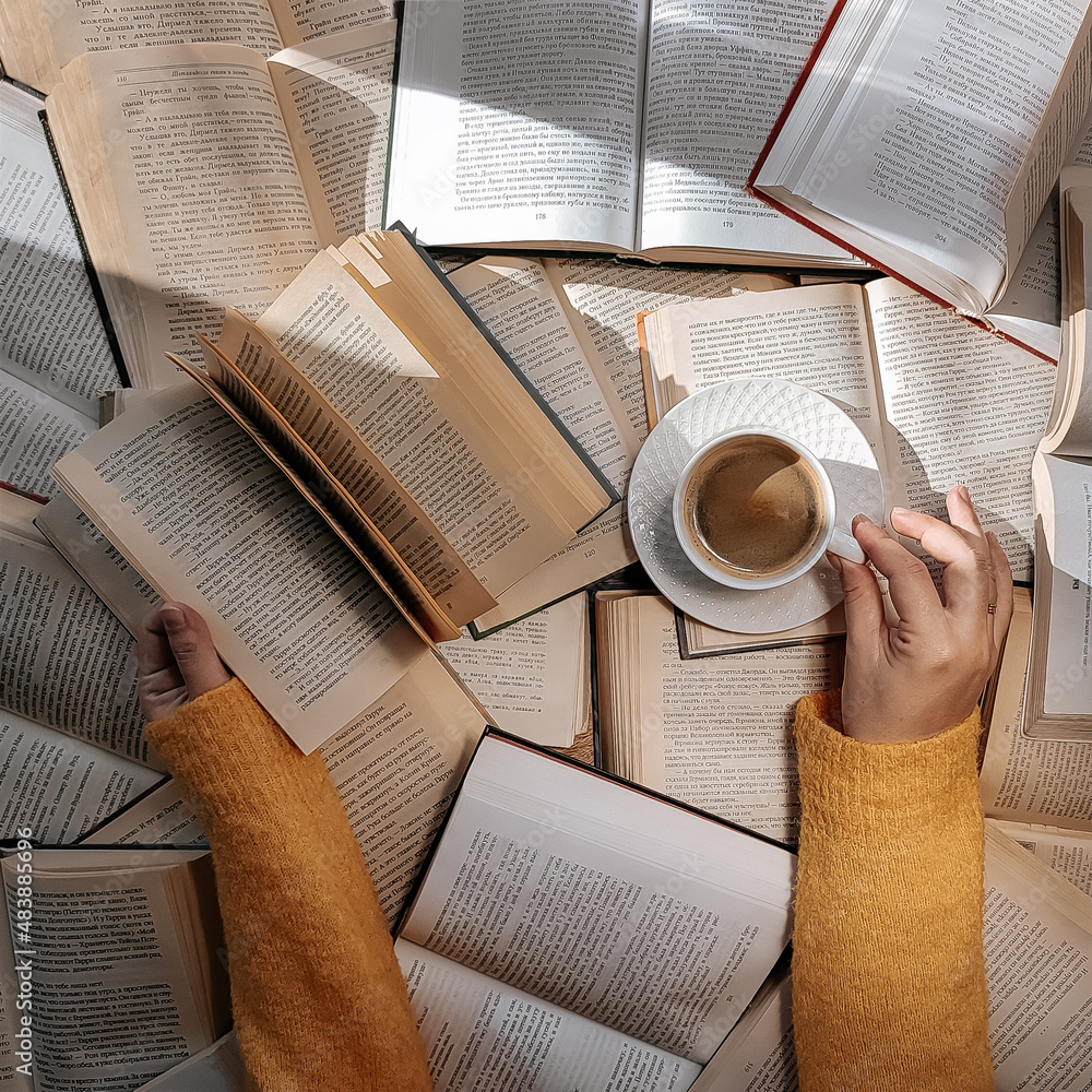 Fototapeta premium cup of coffee and books