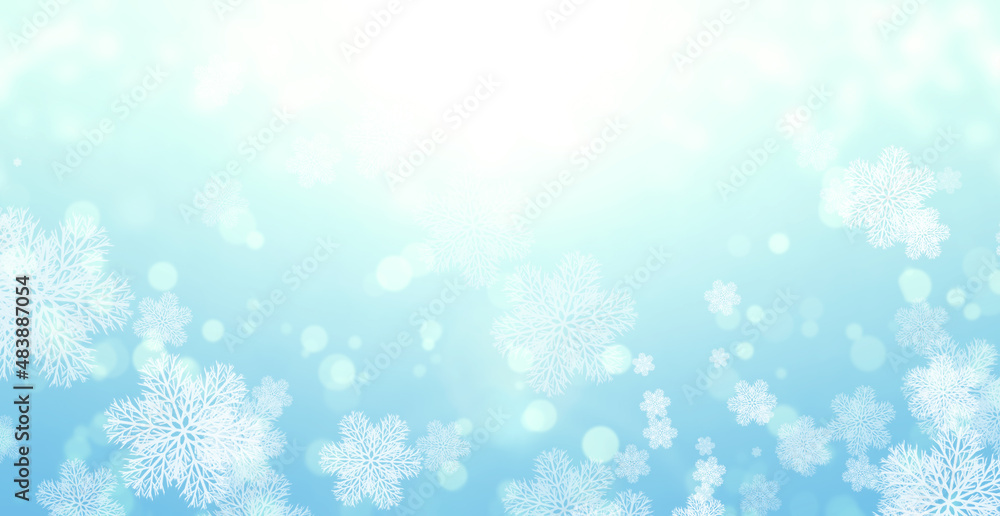 Christmas background of blue color with snowflakes