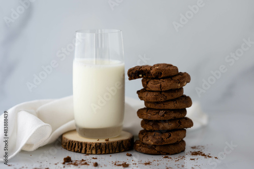 stack of double chocolate chip cookie with glass of milk