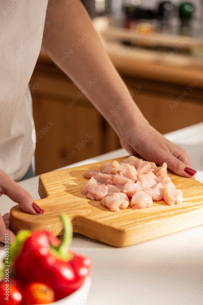 Cooking dinner with chicken on a kitchen
