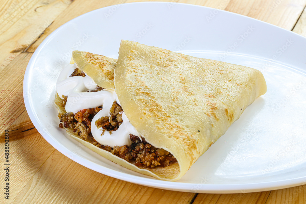 Pancake with minced meat and sauce Pancake with minced meat and sauce