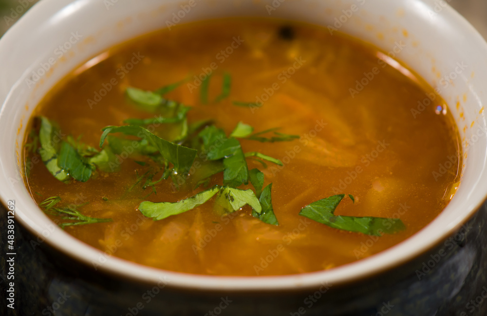 Russian traditional cuisine. A pot of sour cabbage soup. Russian traditional cuisine. A pot of sour cabbage soup.