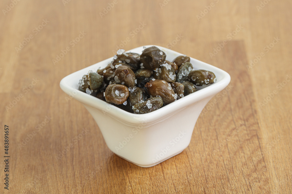 Salted marinated capers snack appetiser Salted marinated capers snack appetiser