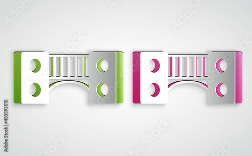 Paper cut Playground kids bridge icon isolated on grey background. Paper art style. Vector