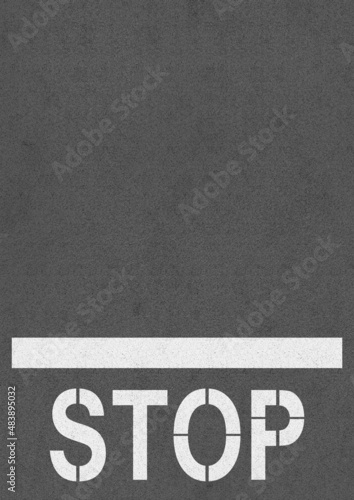 「STOP」の文字がアスファルトに描かれたイラスト photo
