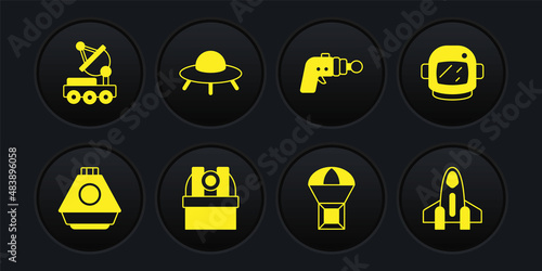 Set Space capsule, Astronaut helmet, Astronomical observatory, Box flying parachute, Ray gun, UFO spaceship, Rocket and Mars rover icon. Vector