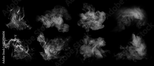 Fog or smoke set isolated on black background. White cloudiness, mist or smog background. photo