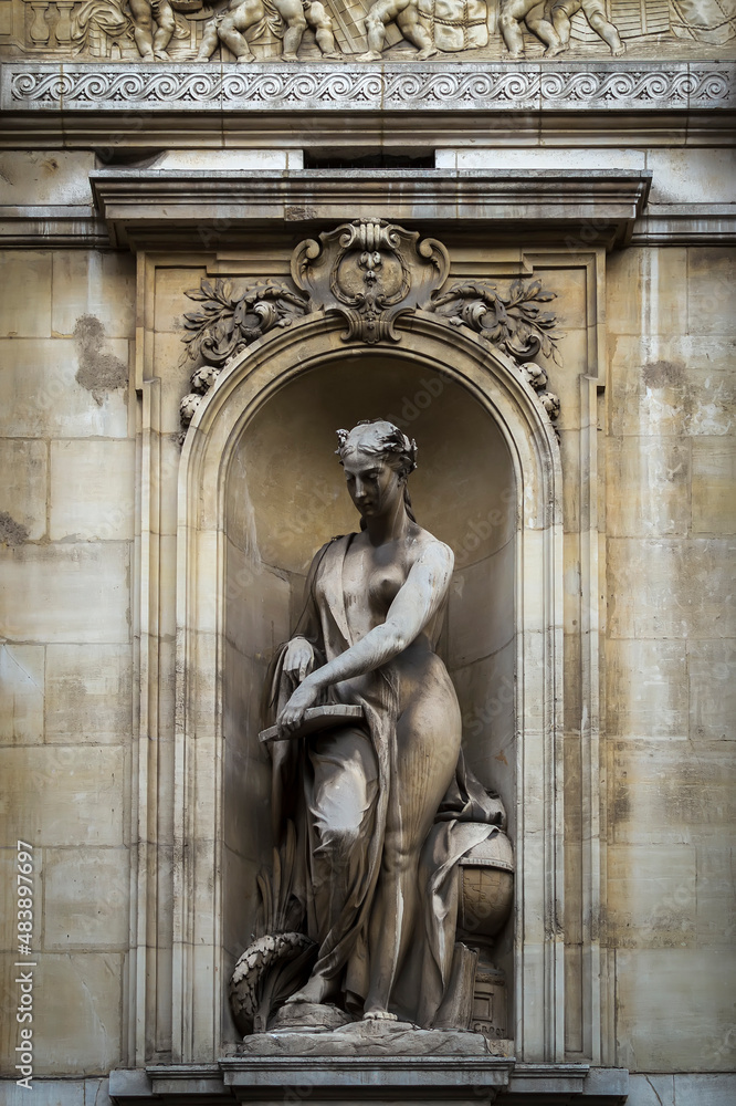 Facade statue of Brussels Stock Exchange building, Brussels, Belgium