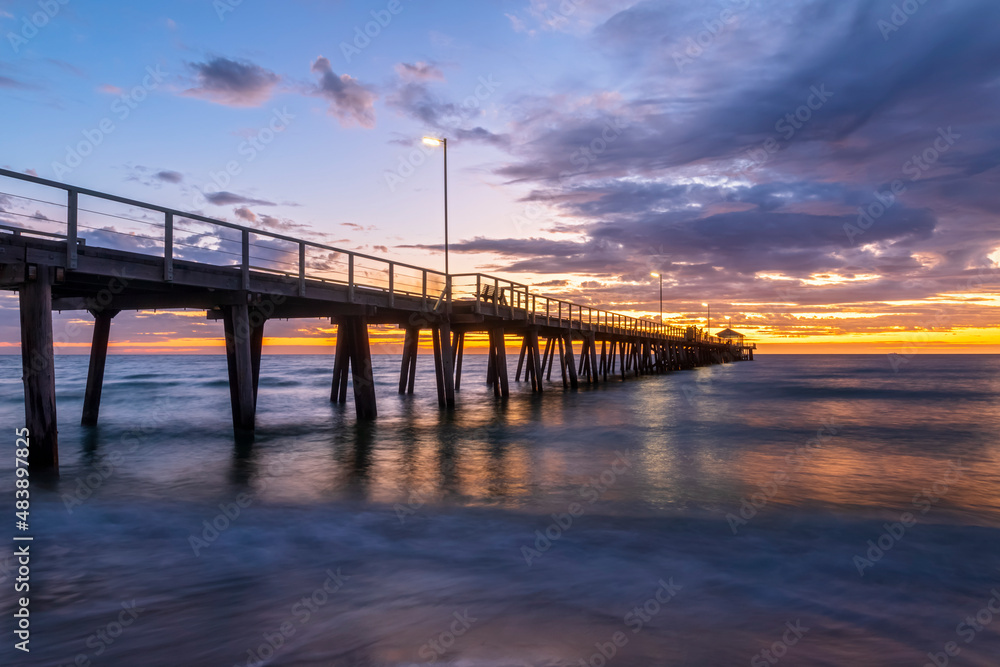 Australia, South Australia, Adelaide, Long exposure of Henley Beach Jetty at cloudy sunset Australia, South Australia, Adelaide, Long exposure of Henley Beach Jetty at cloudy sunset