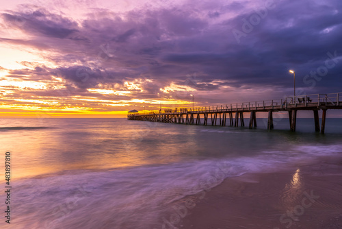 Australia, South Australia, Adelaide, Long exposure of Henley Beach Jetty at purple sunset photo