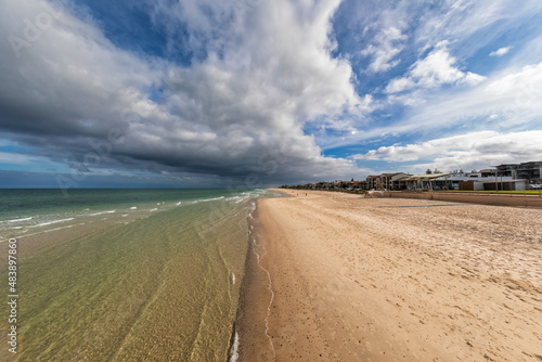 Australia, South Australia, Adelaide, Clouds over empty Henley Beach photo