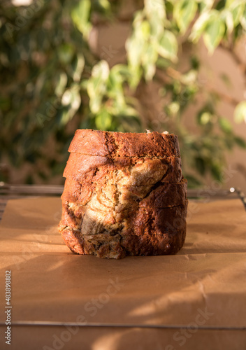 Sliced homemade banana bread on parchment paper