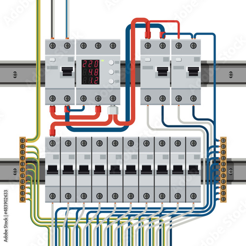 Electrical circuit breakers on din rails connected to wires. Wires are connected to residual current circuit breakers and voltage monitoring relay.
