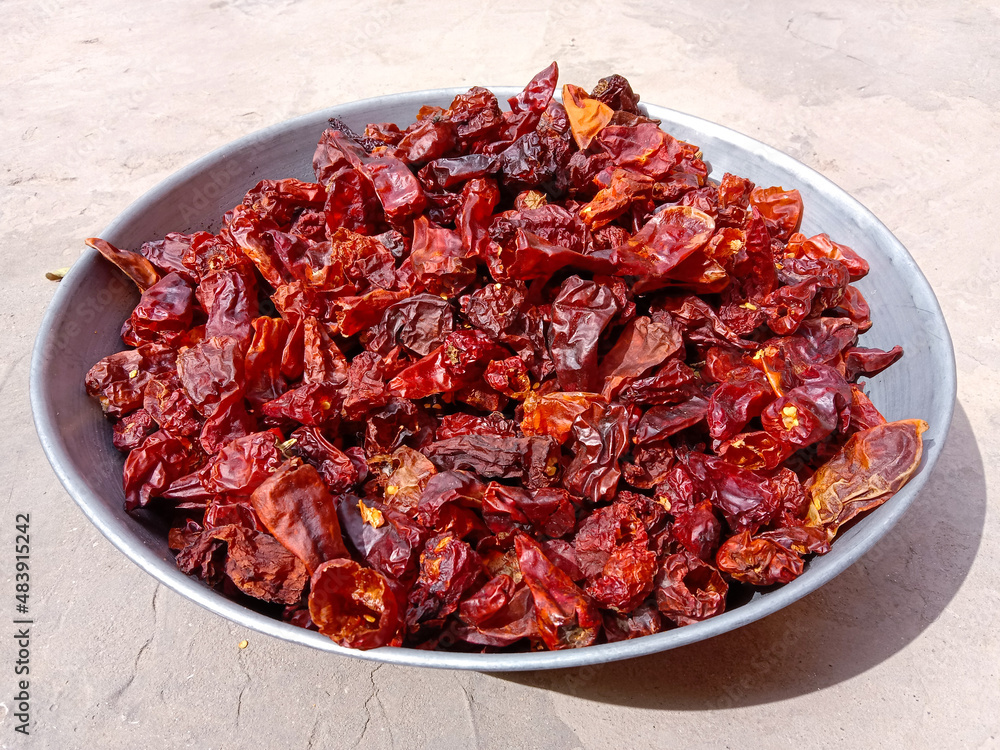 Pile or Group of dried red chili Cayenne pepper background. Red dry chili or chili Cayenne pepper as a food background. smoked dry red paprika spicy. Hot red chili pepper. Close up image Pile or Group of dried red chili Cayenne pepper background. Red dry chili or chili Cayenne pepper as a food background. smoked dry red paprika spicy. Hot red chili pepper. Close up image