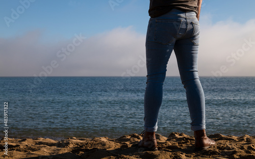 Rear view of adult man on beach. Almeria, Spain