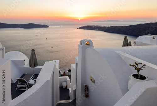 Whitewashed houses at sunset in Imerovigli on Santorini island, Cyclades, Greece
