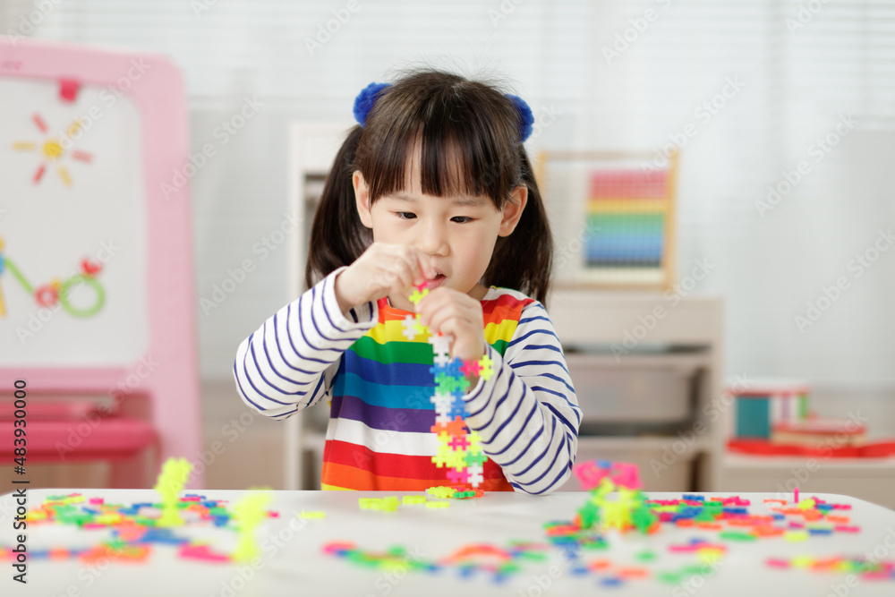 young girl playing creative blocks for homeschooling young girl playing creative blocks for homeschooling