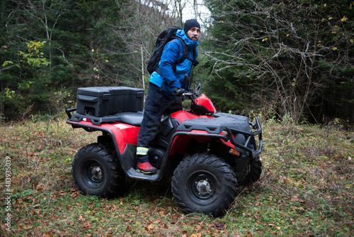 Mountain Rescuer Drives With Quad