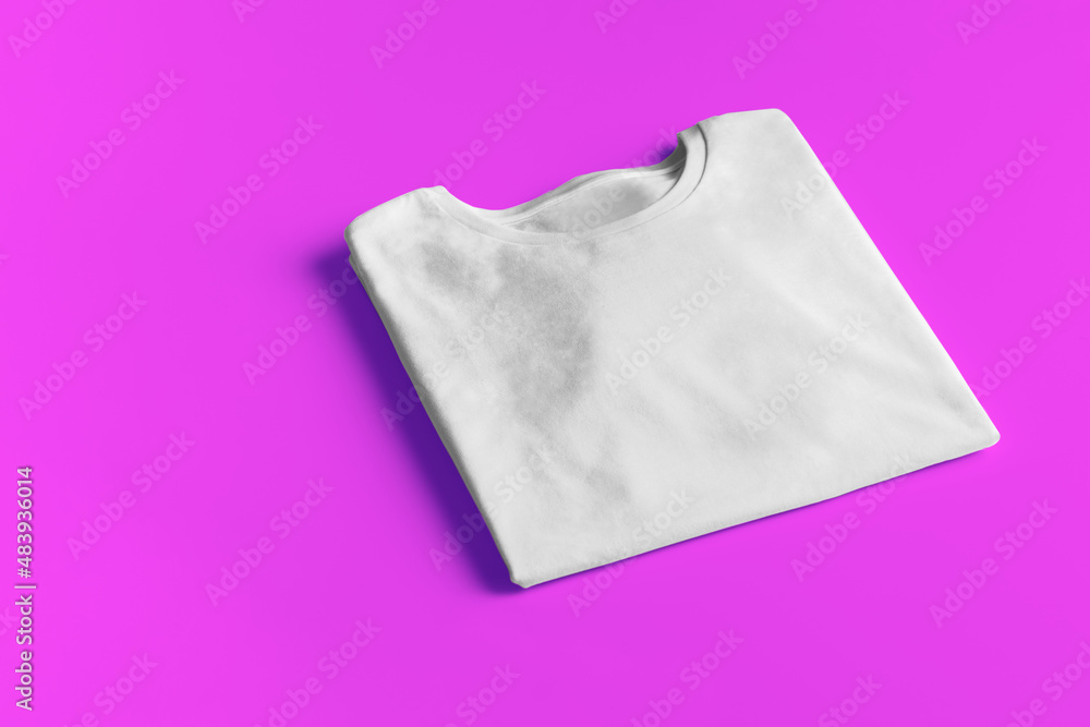 Basic white Tshirt on magenta background. Mock up for branding t-shirt with copyspace. Basic white Tshirt on magenta background. Mock up for branding t-shirt with copyspace.