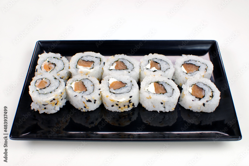 Salmon fish hossomaki in white background Salmon fish hossomaki in white background