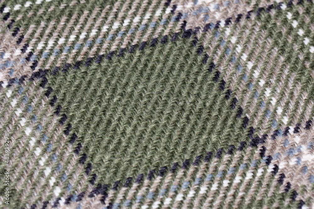texture of jacquard fabric with geometric pattern close-up texture of jacquard fabric with geometric pattern close-up