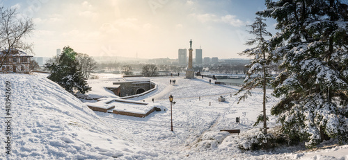 Winter panorama of Belgrade Kalemegdan fortress Sava river and New Belgrade by day with snow