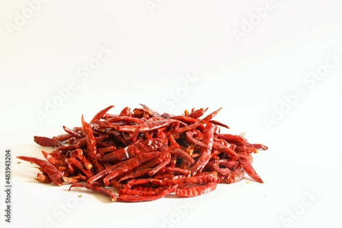 Dried red chili peppers. stock photo isolate on white front view copy space 