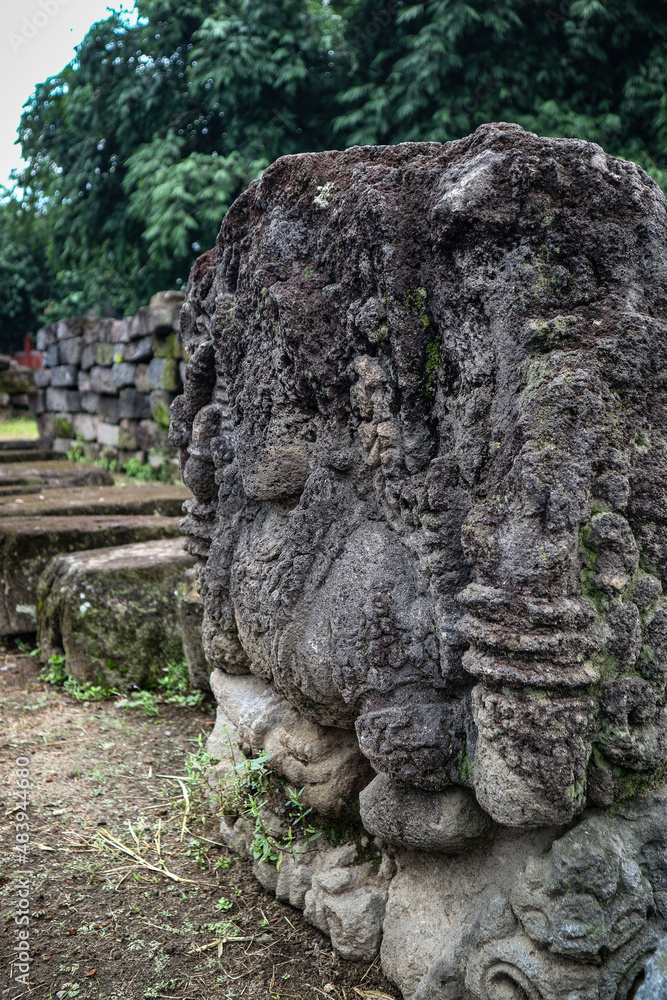 Stone statue in the courtyard of the ancient Surowono temple, Pare, Kediri, Indonesia Stone statue in the courtyard of the ancient Surowono temple, Pare, Kediri, Indonesia