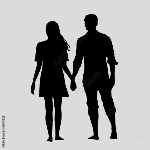 Mann und Frau, Hand in Hand, schwarze Silhouetten vor grauen Hintergrund
