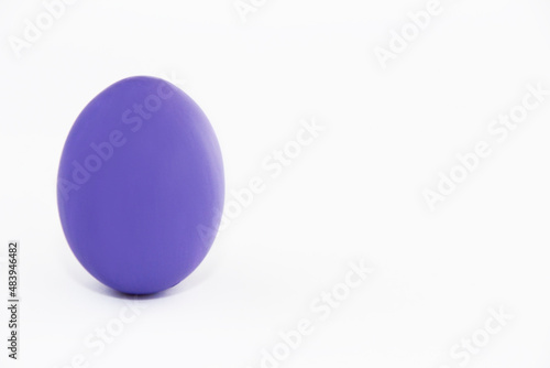 easter egg of violet color very peri on a white background
