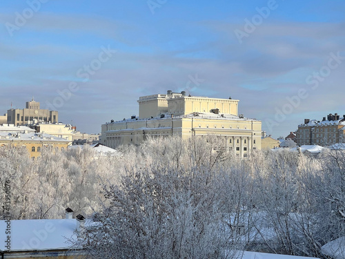 Snow-covered city, trees in the center of Kazan on a frosty winter day