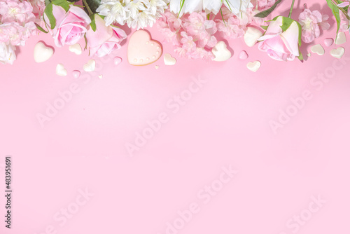 Pink and white spring holiday background with various cute tender flowers. Valentine day, international women's day 8 march, birthday, mother's day greeting card mockup top view flatlay frame © ricka_kinamoto