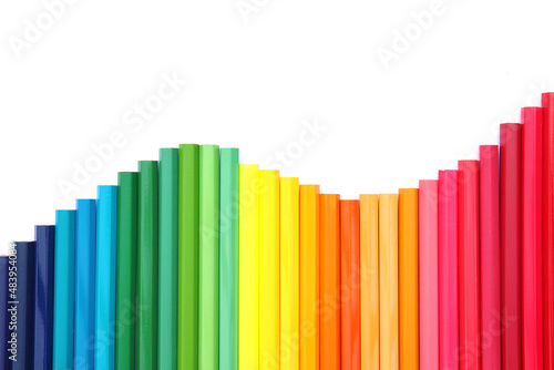 Colored pencils with isolated copy space on white background, educational frame concept.