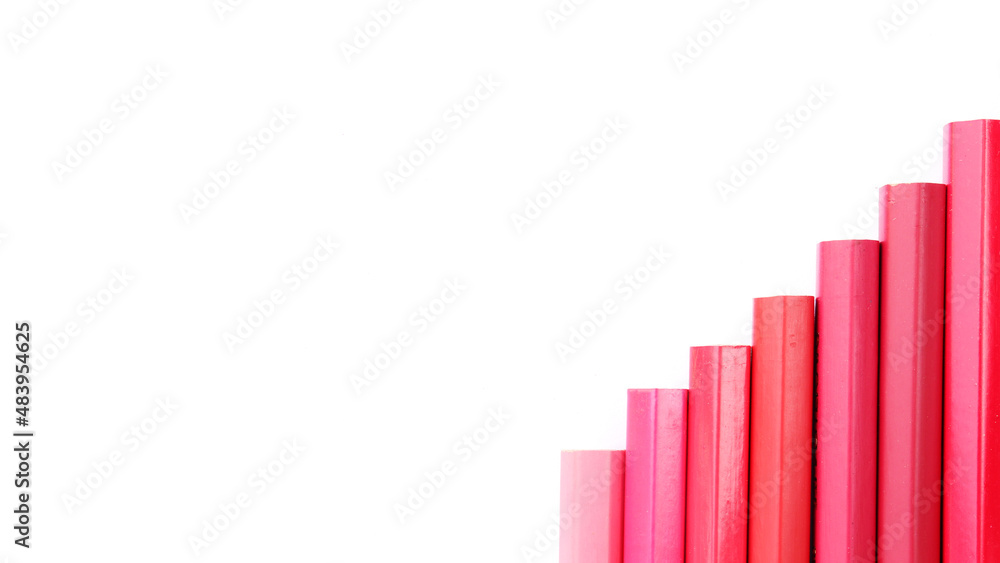Colored pencils lined up on white paper background. Copy space. Back to school. Office supplies. Colored pencils lined up on white paper background. Copy space. Back to school. Office supplies.