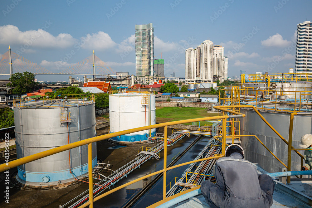 Naklejka premium Male two worker are for inspection ultrasonic thickness roof plate dome top