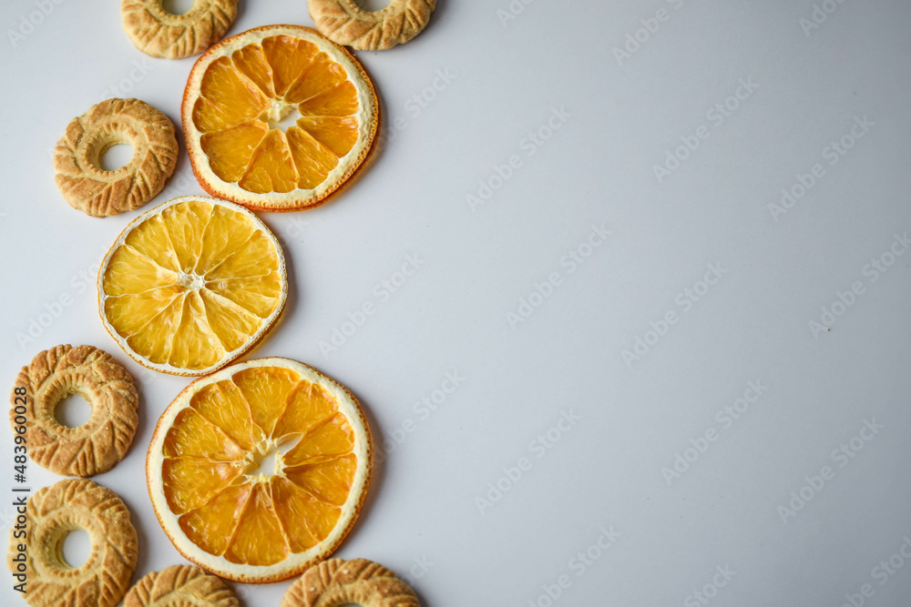 round-shaped cookies and round dry orange slices round-shaped cookies and round dry orange slices