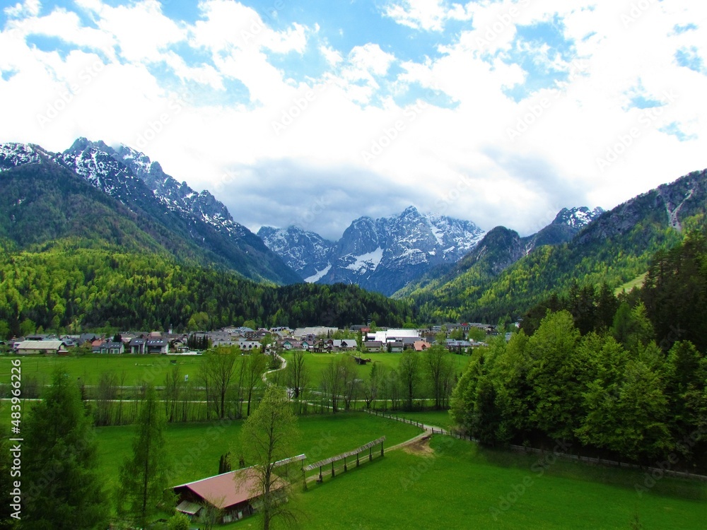 Fototapeta premium Scenic view of a small town of Kranjska Gora in Gorenjska, Slovenia bellow mountains Prisojnik and Razor