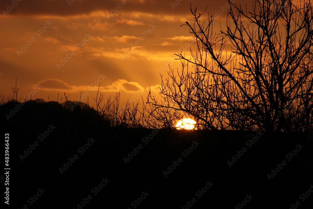 beautiful sunset in the winter, Naunton in Cotswolds beautiful sunset in the winter, Naunton in Cotswolds