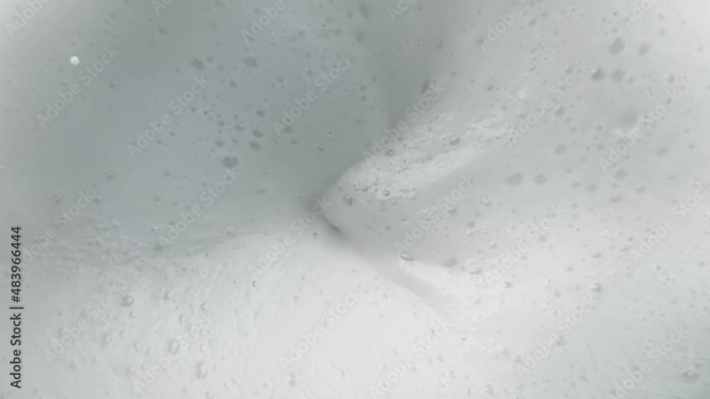 top of view of super slow motion shot of fresh cream white milk vortex, concept of nutrition and health top of view of super slow motion shot of fresh cream white milk vortex, concept of nutrition and health