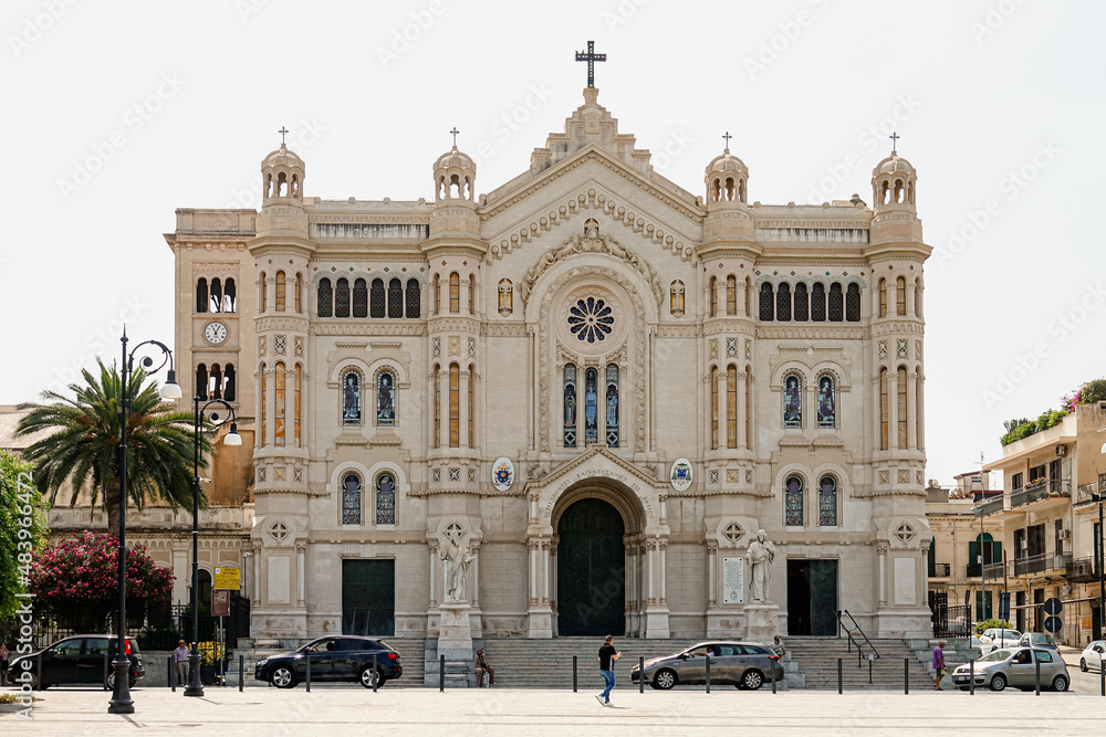 The cathedral in the historic city centre, where it shows its main façade on the wide Piazza. Reggio Calabria, Italy - July 2021