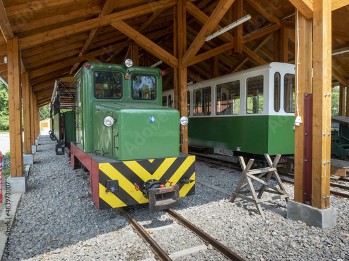 old and restored narrow gauge train in Almamellek in Hungary photo