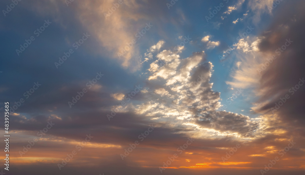 dramatic vibrant and saturated sky with beautiful clouds of sunrise and sunset