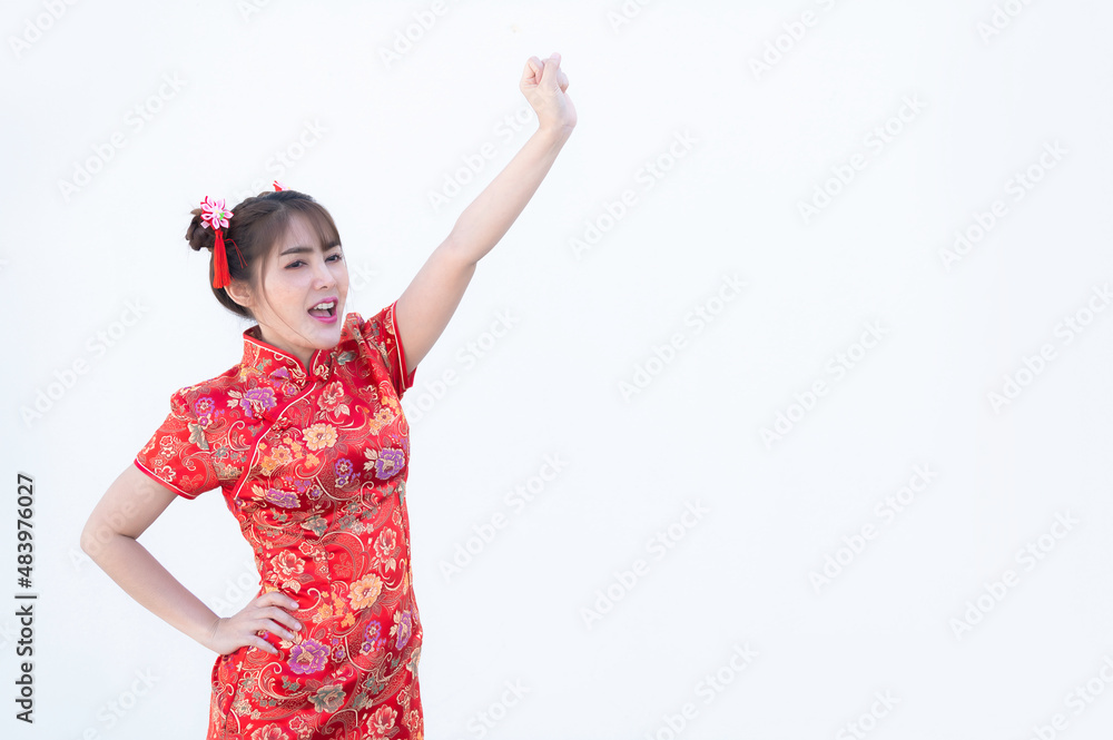 Portrait beautiful asian woman in Cheongsam dress on white background,Thailand people,Happy Chinese new year concept,Happy asian lady in chinese traditional dress Portrait beautiful asian woman in Cheongsam dress on white background,Thailand people,Happy Chinese new year concept,Happy asian lady in chinese traditional dress