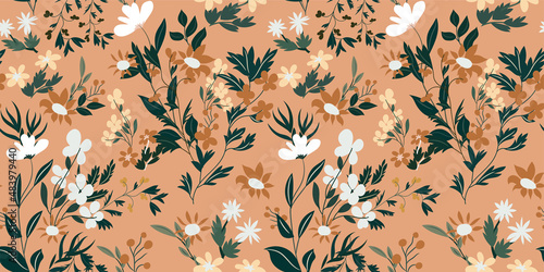 Spring floral pattern with various wildflowers on a pastel coral pink backgro...